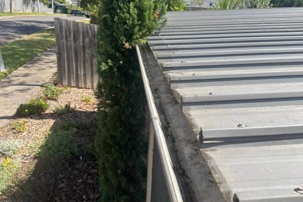 The same gutter cleared of leaf debris