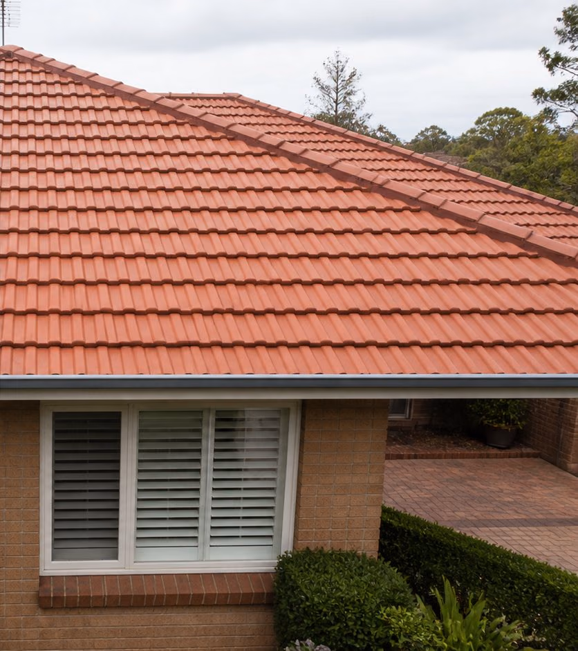 The same tiled roof visualised after restoration and painting